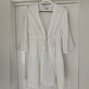 Rhona Sutton white swimsuit coverup with tie waist, embroidery and beading